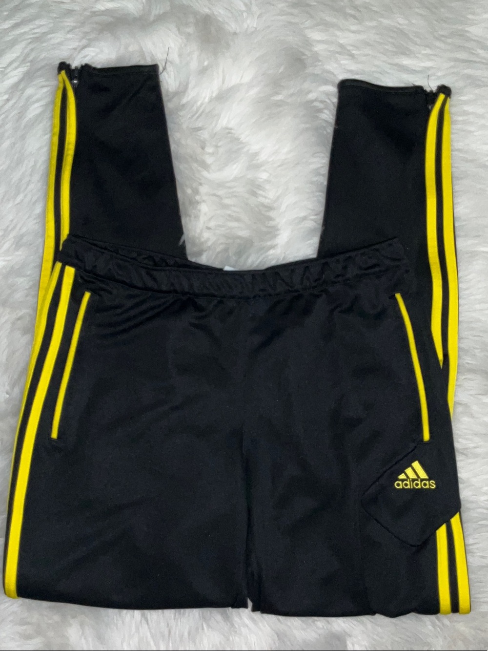 Adidas Tiro Training Pants in black with yellow stripes